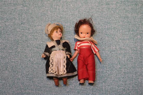 Two late 19th century bisque dolls and other small dolls